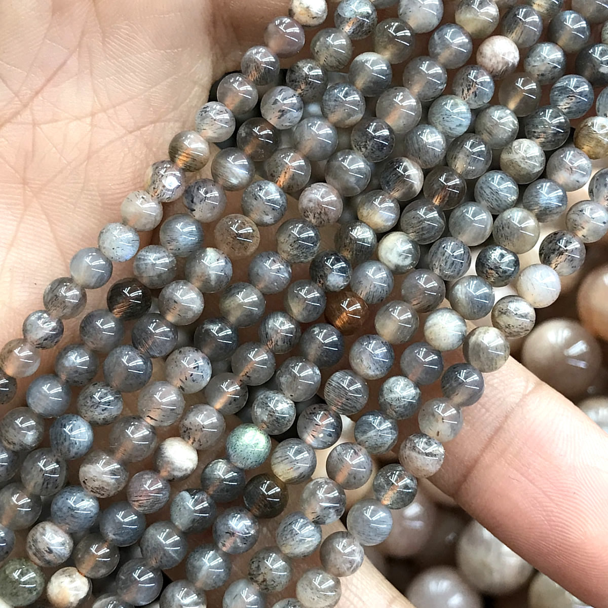 CSS58 Sunstone Beads Smooth Round 4mm 15" Strand
