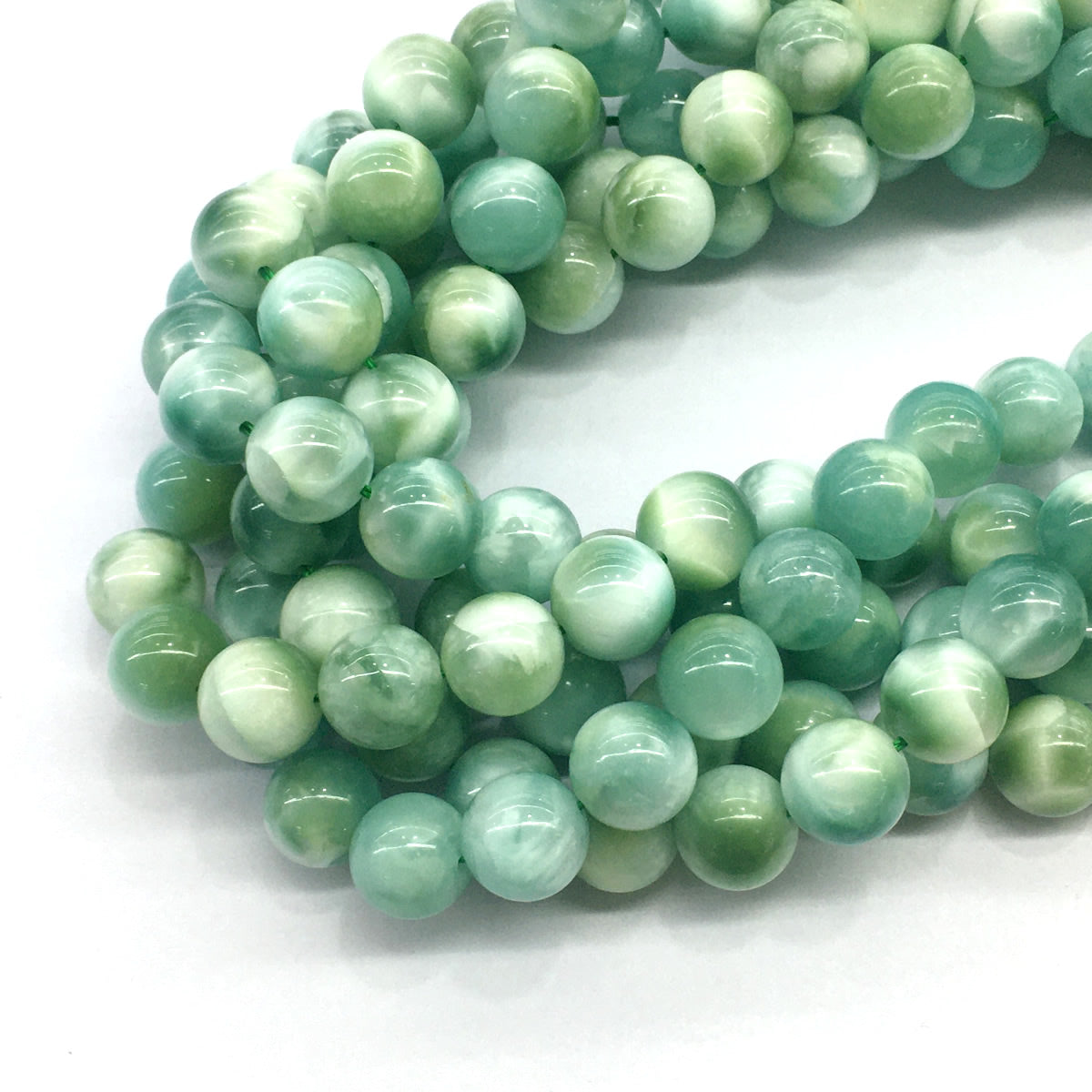 CAS15 Peacock Angelite Beads Smooth Round 12mm 15.5" Strand