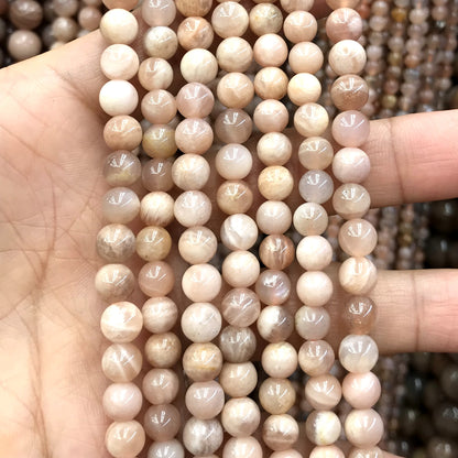 CSS36 Sunstone Beads Smooth Round 6mm 15" Strand