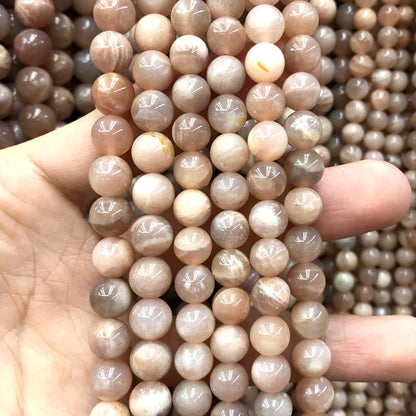 CSS37 Sunstone Beads Smooth Round 8mm 15" Strand