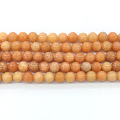 CCA12 Peach Calcite Beads Smooth Round 8mm 15.5" Strand